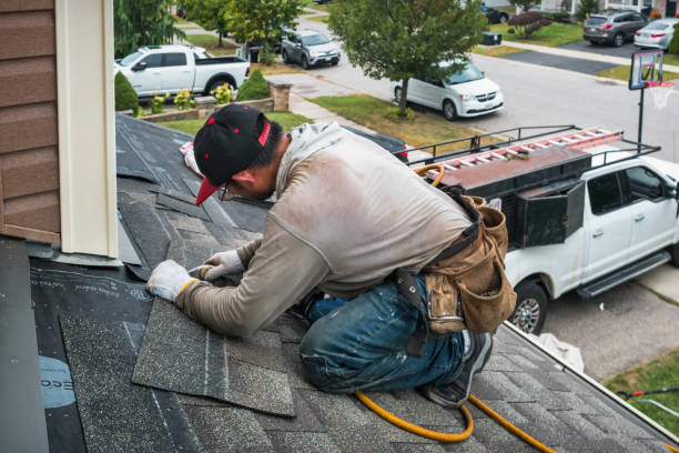 Professional Roof Replacement technician working in Bates City, MO